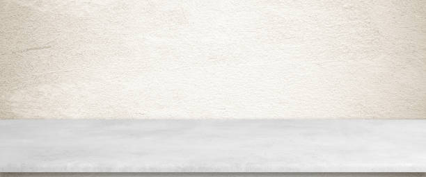 istock Empty white cement table over brown cement concrete wall background, banner, table top, shelf, counter design for product display montage 1384700365