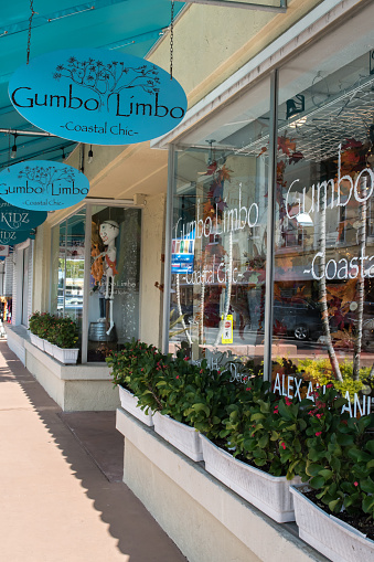 Storefronts and Restaurants along the streets of historic downtown Stuart. Window shopping and casual dining for tourists and locals visiting the Treasure Coast.