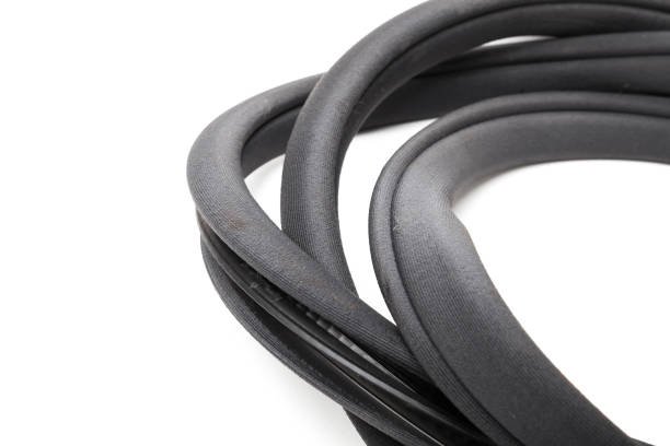 Rolled up black rubber sealant for elements of the car body, doors or trunk, for noise insulation, thermal and sound, preventing heat loss in the car interior. Sealing gasket for repair in a workshop Rolled up black rubber sealant for elements of the car body, doors or trunk, for noise insulation, thermal and sound, preventing heat loss in the car interior. Sealing gasket for repair in a workshop. gasket stock pictures, royalty-free photos & images