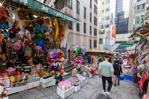 Hong Kong - March 10, 2022 : Street market in Pottinger Street, Central, Hong Kong. Pottinger Street, also known as Stone Slabs Street, was named in 1858 after the first governor of Hong Kong, Henry Pottinger, who served from 1843 to 1844.