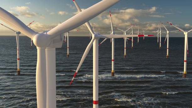 Offshore Wind Turbine in a Windfarm Offshore Wind Turbine in a Windfarm offshore wind farm stock pictures, royalty-free photos & images