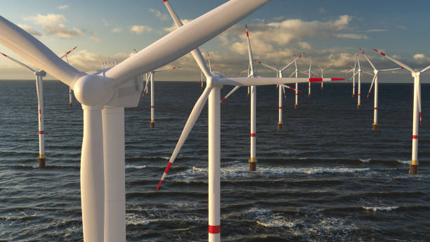 Offshore Wind Turbine in a Windfarm Offshore Wind Turbine in a Windfarm offshore wind farm stock pictures, royalty-free photos & images
