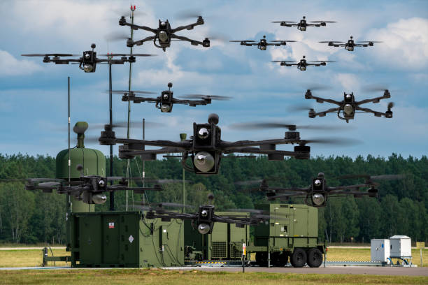Swarm of combat drones  and command systems Swarm of combat drones  and command systems autonomous technology stock pictures, royalty-free photos & images