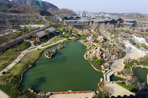 Nanjing, China - March 8, 2022: The beautiful Jiangsu Garden Expo park becomes a new destination for Internet celebrities. It was once the remains of quarrying pits and abandoned factories.