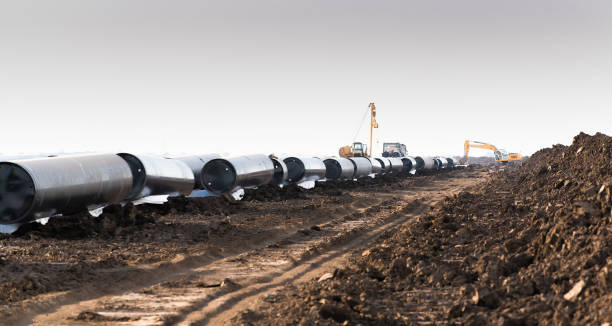 istock Laying gas pipelines in the field 1384745952