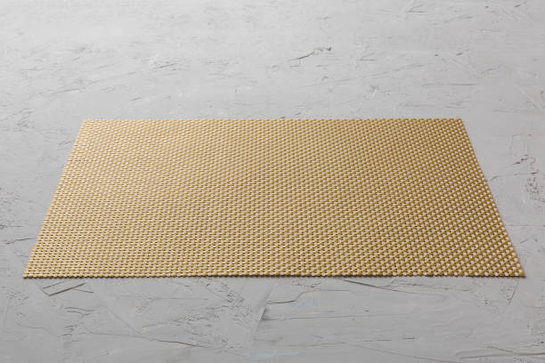 istock Perspective view of brown tablecloth for food on cement background. Empty space for your design 1384747885