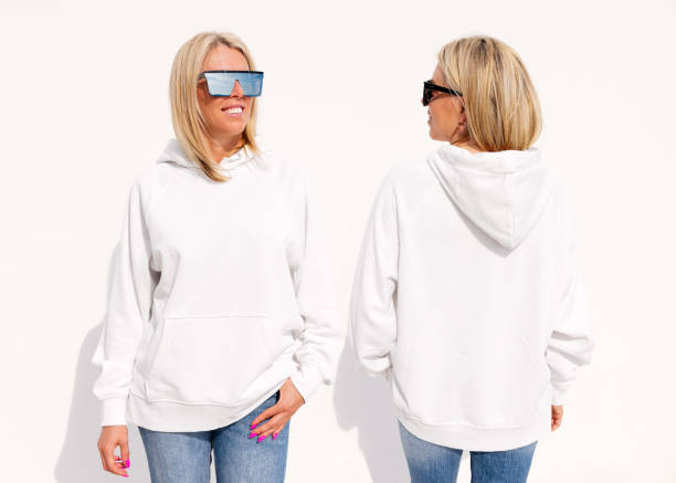 istock Woman wearing blank white hoody, front and back view 1384755051