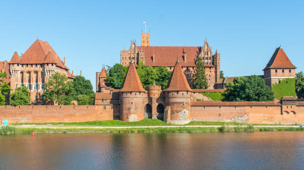 Malbork Castle, Northern Poland Malbork, Poland - largest castle in the world by land area, and a Unesco World Heritage Site, the Malbork Castle is a wonderful exemple of Teutonic fortress. Here in particular the interiors malbork photos stock pictures, royalty-free photos & images