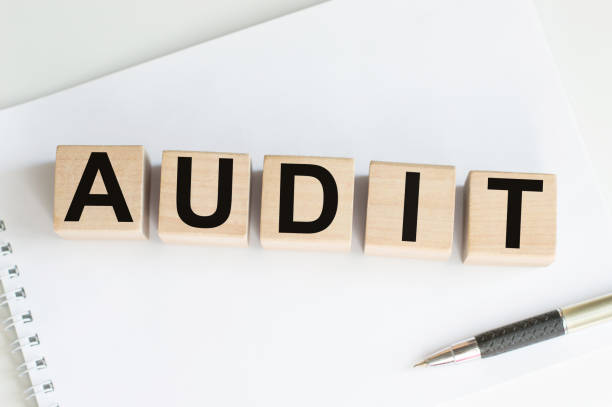 istock word audit. Audit text on wooden blocks. 1384772841