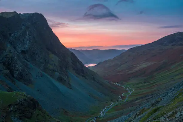 Epic landscape image of view down Honister Pass to Buttermere from Dale Head in Lake District during Autumn sunset