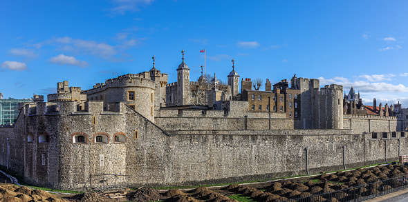 The Tower of London, officially Her Majesty's Royal Palace and Fortress of the Tower of London, is a historic castle on the north bank of the River Thames.
