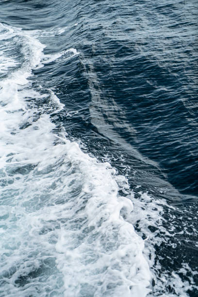 istock Blue water texture from the sea and waves 1384777575