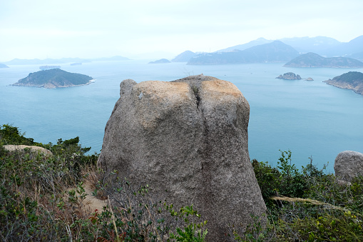 Large rock overlooking the South China sea at Chung Hom Kok cape, located on Hong Kong island south coast, on the west of Stanley.