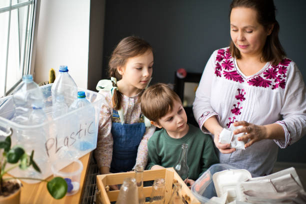 istock Family  sorting out waste for recycling 1384797501