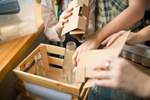 istock Family  sorting out waste for recycling 1384802987