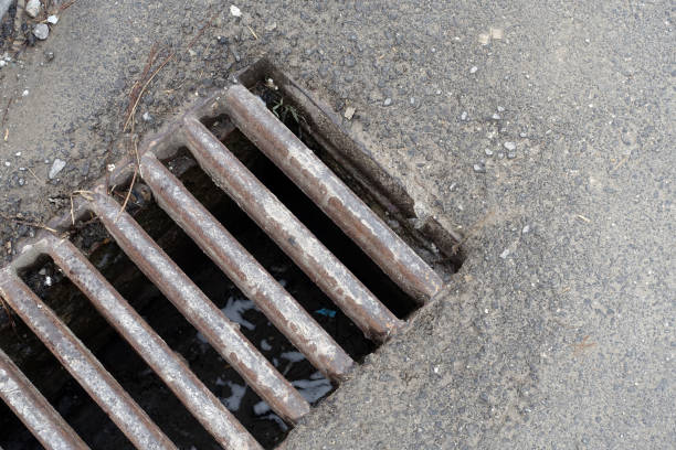istock sewer grate,close-up big sewer grate in the city, 1384804909