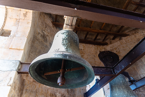 Old church bell in the tower of an old christian church in Salamanca, Spain