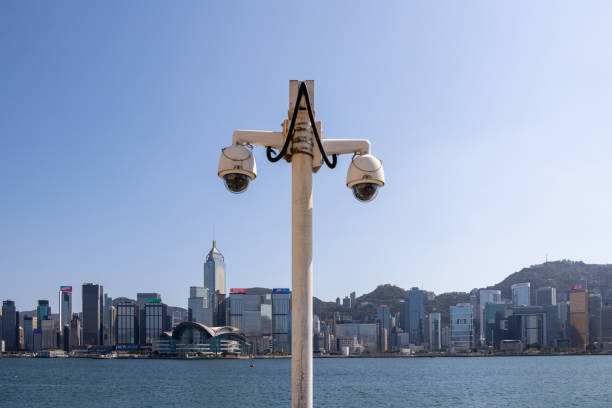 istock Hong Kong skyline with security cameras 1384820648