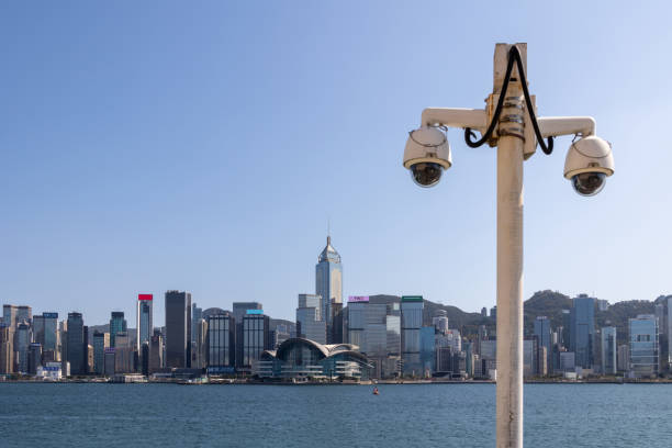 istock Hong Kong skyline with security cameras 1384820831