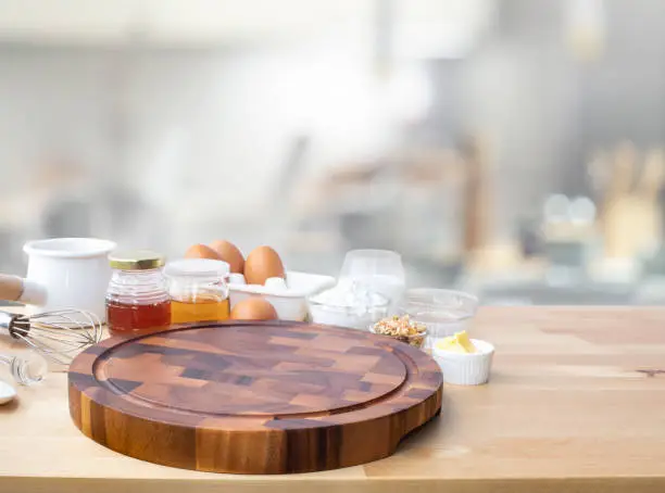 Photo of Cooking breakfast food or bakery with ingredient and copy space of chopping board background.