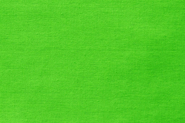 istock Green lime cotton fabric cloth texture for background, natural textile pattern. 1384830077