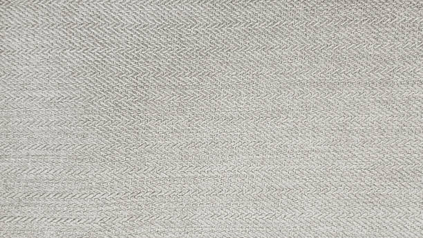 tela de cachemira beige gris en patrón de tweed de espiga, textura de tela de lana virgen como fondo. costoso traje de tela para hombres. cortinas interiores o fondo de tapicería. - textured upholstered choice colors fotografías e imágenes de stock