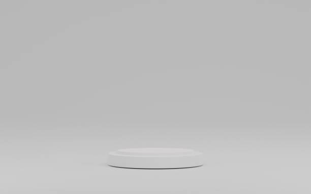 istock 3d render of minimalist podium in white gray studio and lighting for product display. 1384835278