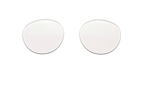Two green gradient sun protection plastic eyeglass lens on Black - white background.