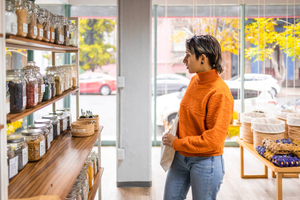 istock Young woman looking for healthy ingredients 1384837183