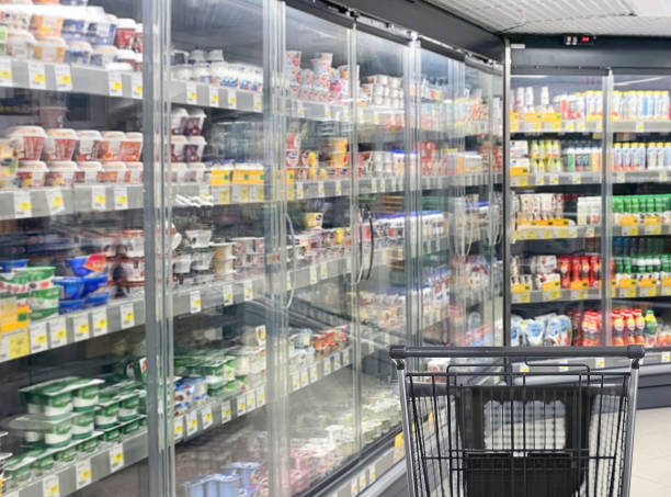 istock empty grocery cart in an empty supermarket 1384839371