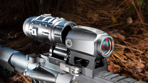 istock Red dot sight and magnifier on an AR-15 1384839452