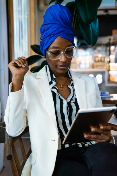 istock business women in a cafe 1384840308