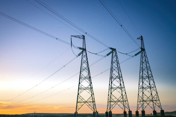 istock Industrial high voltage electricity tower 1384840509