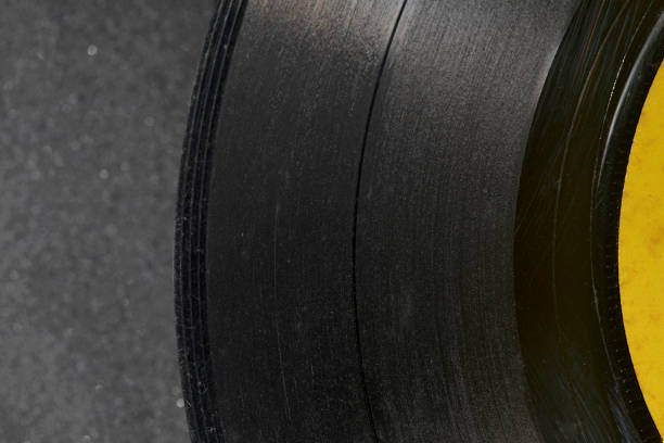 istock Old vinyl record, close-up, scratches visible 1384846964