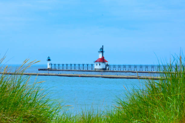istock Lighthouse-Harbor lighthouse-with elevated winter catwalk-Benton Harbor Michigan 1384853393