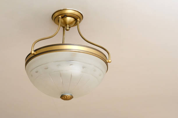 istock Chandelier in vintage style hanging from the ceiling 1384856953