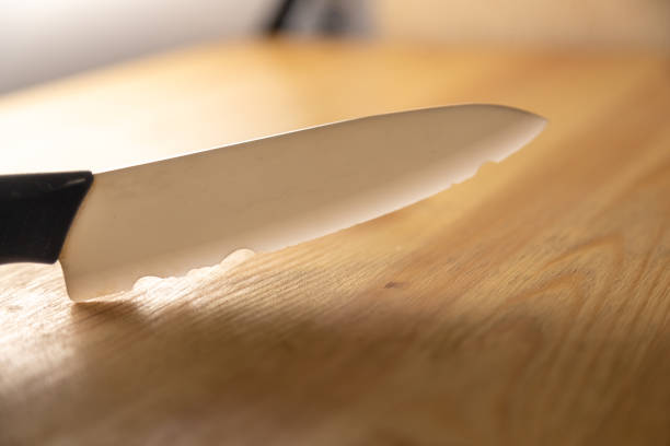 istock old broken ceramic knife on wooden table 1384858508