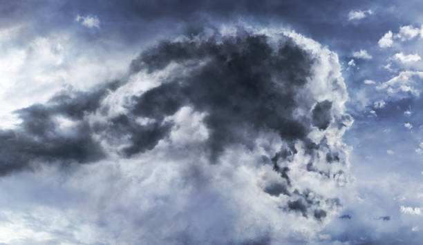 Skull shaped cloud stock photo