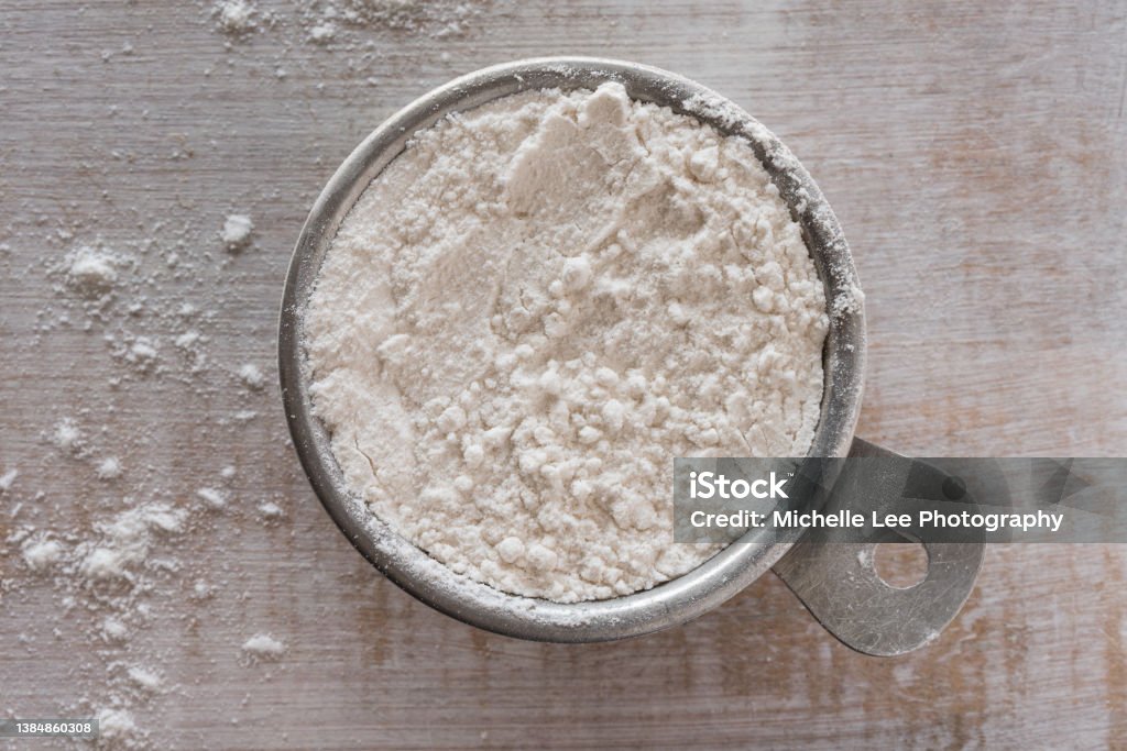 All Purpose Flour in a Measuring Cup Flour Stock Photo