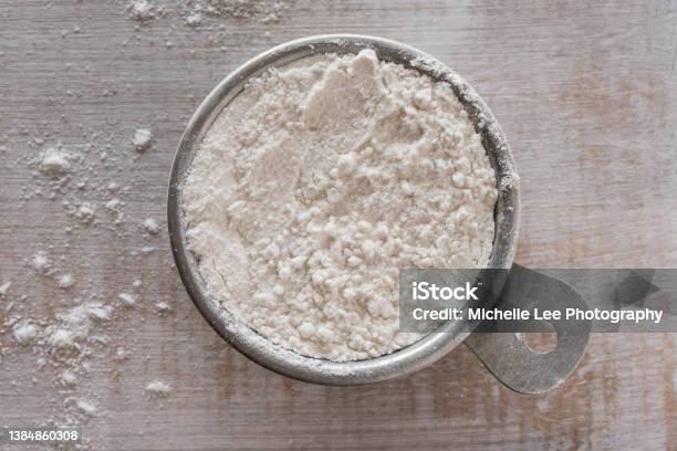 All Purpose Flour In A Measuring Cup Stock Photo - Download Image Now - Flour, Determination, Close-up