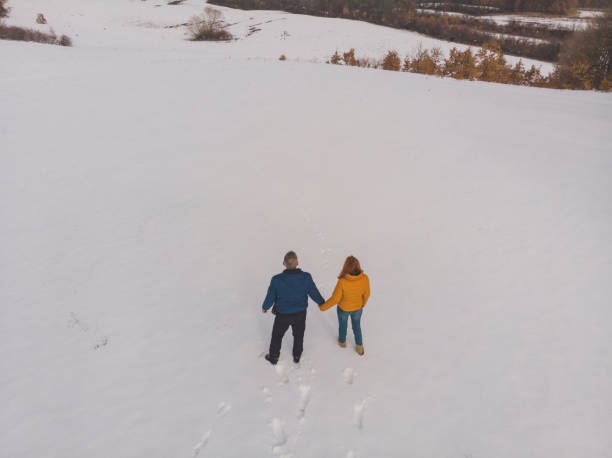 istock Happy couple enjoy in winter 1384864860