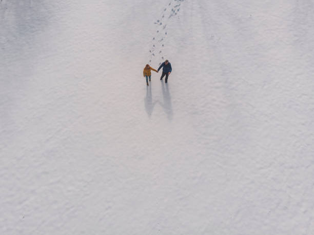 istock Happy couple enjoy in winter 1384864864
