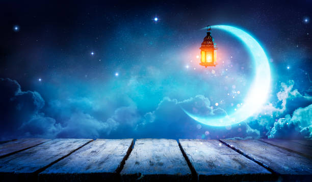 Ramadan Kareem - Moon And Arabic Lantern On Table With Abstract Defocused Lights - Eid Ul Fitr stock photo