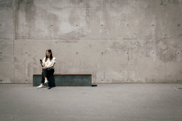 istock woman with mobile phone 1384867395