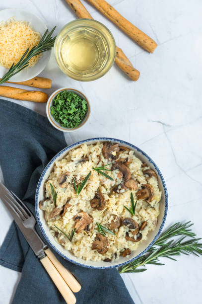 istock Risotto with Mushroom cheese and rosemary 1384868182