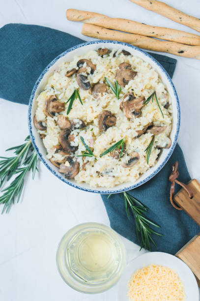 istock Risotto with Mushroom cheese and rosemary 1384868882