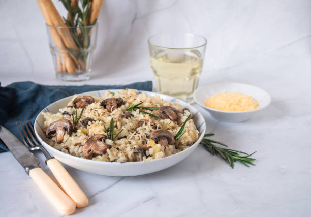 istock Risotto with Mushroom cheese and rosemary 1384869064