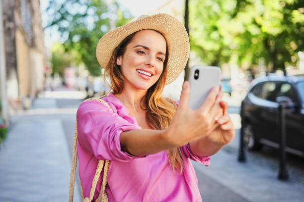 istock Woman takes selfie during summer vacation 1384870898
