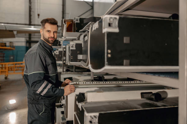 istock Bearded man airplane mechanic working in hangar 1384876042