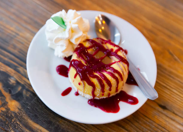istock Dessert with sorbet, donut and syrup 1384883183